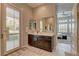 Bright bathroom with access to the bedroom and walk-in shower at 12318 Tudor Arch Dr, Las Vegas, NV 89138