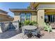 Outdoor kitchen and patio space includes a built-in barbecue with seating, ideal for entertaining at 12318 Tudor Arch Dr, Las Vegas, NV 89138