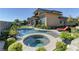 Aerial view of backyard pool and spa, showcasing the landscaping and outdoor space at 12318 Tudor Arch Dr, Las Vegas, NV 89138