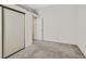 Neutral bedroom featuring carpet and a closet with sliding doors at 1356 Pleasant Brook St, Las Vegas, NV 89142