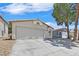 Charming single-story home boasting an attached two-car garage and well-maintained front yard at 1356 Pleasant Brook St, Las Vegas, NV 89142