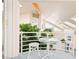 Interior balcony with greenery and views of the house and mountains at 1409 Pueblo Dr, Boulder City, NV 89005