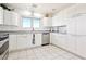 Bright kitchen with white cabinets, stainless steel appliances, and a scenic view at 1409 Pueblo Dr, Boulder City, NV 89005