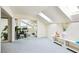 Bright living area with skylights, mountain views, and an open floor plan at 1409 Pueblo Dr, Boulder City, NV 89005