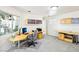 Well lit office with large windows and built in shelves and cabinets at 1409 Pueblo Dr, Boulder City, NV 89005