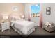Charming secondary bedroom with a soft color palette, a cozy armchair, and plenty of natural light at 145 Harmonica Ave # Lot 23, Henderson, NV 89015