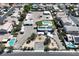 Expansive aerial view of property featuring a pool, garage, RV parking, desert landscaping, and space to roam at 1595 E Camero Ave, Las Vegas, NV 89123