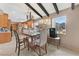 Eat-in kitchen features a dining area and a large window for natural light at 1595 E Camero Ave, Las Vegas, NV 89123