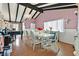 Elegant dining room features a chandelier, beautiful wood floors and lots of light at 1595 E Camero Ave, Las Vegas, NV 89123