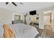 Bright main bedroom includes a closet and a view of the en-suite bathroom at 1595 E Camero Ave, Las Vegas, NV 89123