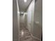Hallway featuring wood floors and neutral-toned walls for a simple design at 1619 Tangerine Rose Dr, Las Vegas, NV 89142