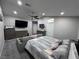Spacious main bedroom featuring a vaulted ceiling, soft carpet, and comfortable furnishings at 1619 Tangerine Rose Dr, Las Vegas, NV 89142