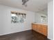 Versatile space with wood-look floors, built-in cabinets and a sink at 1924 Coralino Dr, Henderson, NV 89074