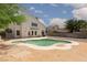 Exterior view showcasing the pool and a two-story house at 1924 Coralino Dr, Henderson, NV 89074