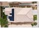Aerial view of home with solar panels on the roof and lush backyard at 2021 Pelican Sky Beach Ave, North Las Vegas, NV 89081