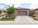 Charming single-story home with a well-maintained lawn and inviting curb appeal, perfect for a Gathering at 2021 Pelican Sky Beach Ave, North Las Vegas, NV 89081