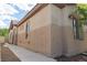 Neutral, two-tone exterior of the property showing architectural features and design at 2021 Pelican Sky Beach Ave, North Las Vegas, NV 89081