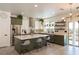 Beautiful kitchen featuring a central island, stainless steel appliances, and lots of natural light at 2021 Pelican Sky Beach Ave, North Las Vegas, NV 89081