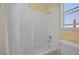 Classic bathroom featuring a tub-shower combination, tile surround, and a functional vanity at 2147 Bridle Wreath Ln, Las Vegas, NV 89156