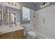 Bathroom featuring modern fixtures, white tiled shower and neutral wall coloring at 2147 Bridle Wreath Ln, Las Vegas, NV 89156