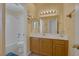 Cozy bathroom with decorative paint, a built-in tub and shower, and updated hardware at 2147 Bridle Wreath Ln, Las Vegas, NV 89156