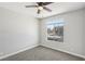 Bedroom with a carpeted floor, ceiling fan, and a window that provides plenty of natural light at 2201 Ramsgate Dr # 327, Henderson, NV 89074