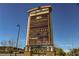 A community sign featuring the restaurants, shops and businesses within the district at 2201 Ramsgate Dr # 327, Henderson, NV 89074