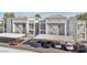 Condo building exterior showcasing assigned covered parking spaces for residents and guest parking at 2201 Ramsgate Dr # 327, Henderson, NV 89074