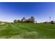 View of the impeccably maintained golf course and clubhouse in this desirable community at 2201 Ramsgate Dr # 327, Henderson, NV 89074