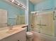Bathroom featuring a shower/tub combination with modern glass door and grab bar at 2343 Scotch Lake St, Las Vegas, NV 89134