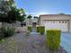 Charming single-story home with a well-manicured front yard and desert landscaping at 2343 Scotch Lake St, Las Vegas, NV 89134