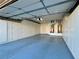 Spacious garage featuring ample storage cabinets, and epoxy flooring for a clean, organized space at 2343 Scotch Lake St, Las Vegas, NV 89134