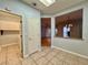 Hallway view leading to other rooms, featuring tiled flooring and neutral wall colors at 2343 Scotch Lake St, Las Vegas, NV 89134