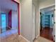 Hallway connecting rooms with a peek into the kitchen and bedroom at 2343 Scotch Lake St, Las Vegas, NV 89134