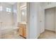 Bright bathroom with a shower-tub combination and a single sink vanity at 2804 Sapphire Desert Dr, Henderson, NV 89052