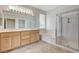 Bathroom features double sinks, a soaking tub, and a large glass-enclosed shower for your comfort at 2804 Sapphire Desert Dr, Henderson, NV 89052