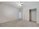 Bedroom offers a standard closet, plush carpet and a ceiling fan at 2804 Sapphire Desert Dr, Henderson, NV 89052