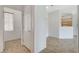Bright and airy entryway with tile flooring leading into other rooms of the home at 2804 Sapphire Desert Dr, Henderson, NV 89052