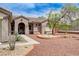 Single-story home featuring desert landscaping, a two-car garage, and a covered entrance at 2804 Sapphire Desert Dr, Henderson, NV 89052