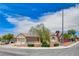 Desert-landscaped home situated on a corner lot with a two-car garage at 2804 Sapphire Desert Dr, Henderson, NV 89052