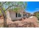 Well-manicured backyard with covered patio offers ample space for outdoor living at 2804 Sapphire Desert Dr, Henderson, NV 89052