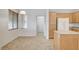 Open kitchen layout featuring tile flooring, oak cabinets, and center island at 2804 Sapphire Desert Dr, Henderson, NV 89052