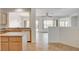Spacious kitchen featuring tile floors, a central island, and an open layout at 2804 Sapphire Desert Dr, Henderson, NV 89052