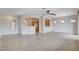 Bright, open-concept living area featuring neutral tile flooring and lots of natural light at 2804 Sapphire Desert Dr, Henderson, NV 89052