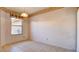 Bright dining area with tile flooring and decorative wallpaper border detail at 305 Crosswind Way, Las Vegas, NV 89145