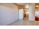 Open layout with the dining area leading to the kitchen and an included refrigerator at 305 Crosswind Way, Las Vegas, NV 89145