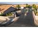 Community entrance featuring manicured landscaping, and a secure gated entrance, ensuring peace of mind at 305 Crosswind Way, Las Vegas, NV 89145