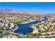 Scenic view of a community with lakefront homes and mountain backdrop at 3109 Siena Cir, Las Vegas, NV 89128