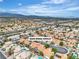 Wide aerial view showcasing the community near scenic mountain and desert landscapes at 3109 Siena Cir, Las Vegas, NV 89128