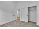 Bright bedroom with carpet, closet, and doorway, offering plenty of storage at 3109 Siena Cir, Las Vegas, NV 89128